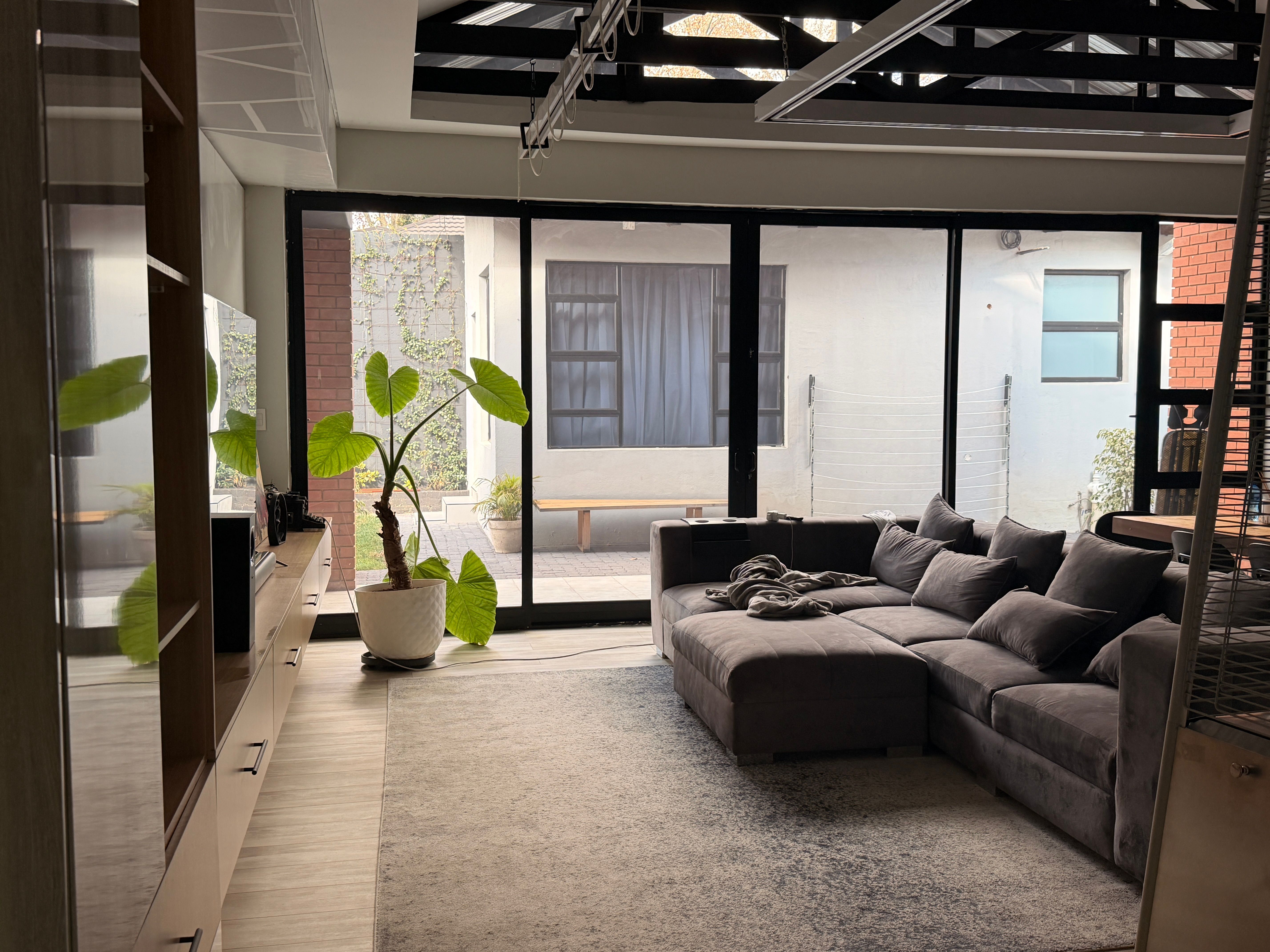 Unfinished apartment interior with plans and tools on site in Warsaw